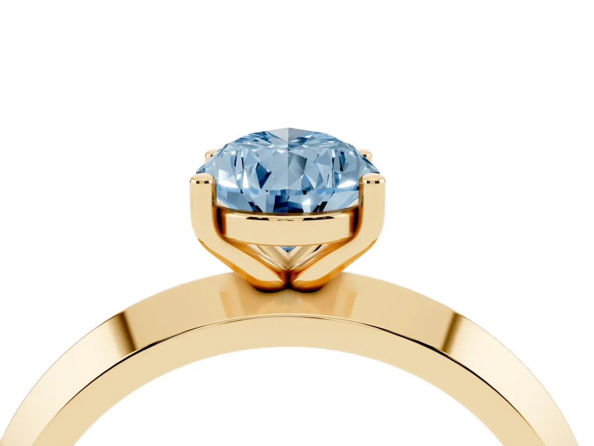 Fancy Blue Pear Cut Cut Solitaire Engagement Ring with Flat Band and Four-Prong Setting Yellow gold