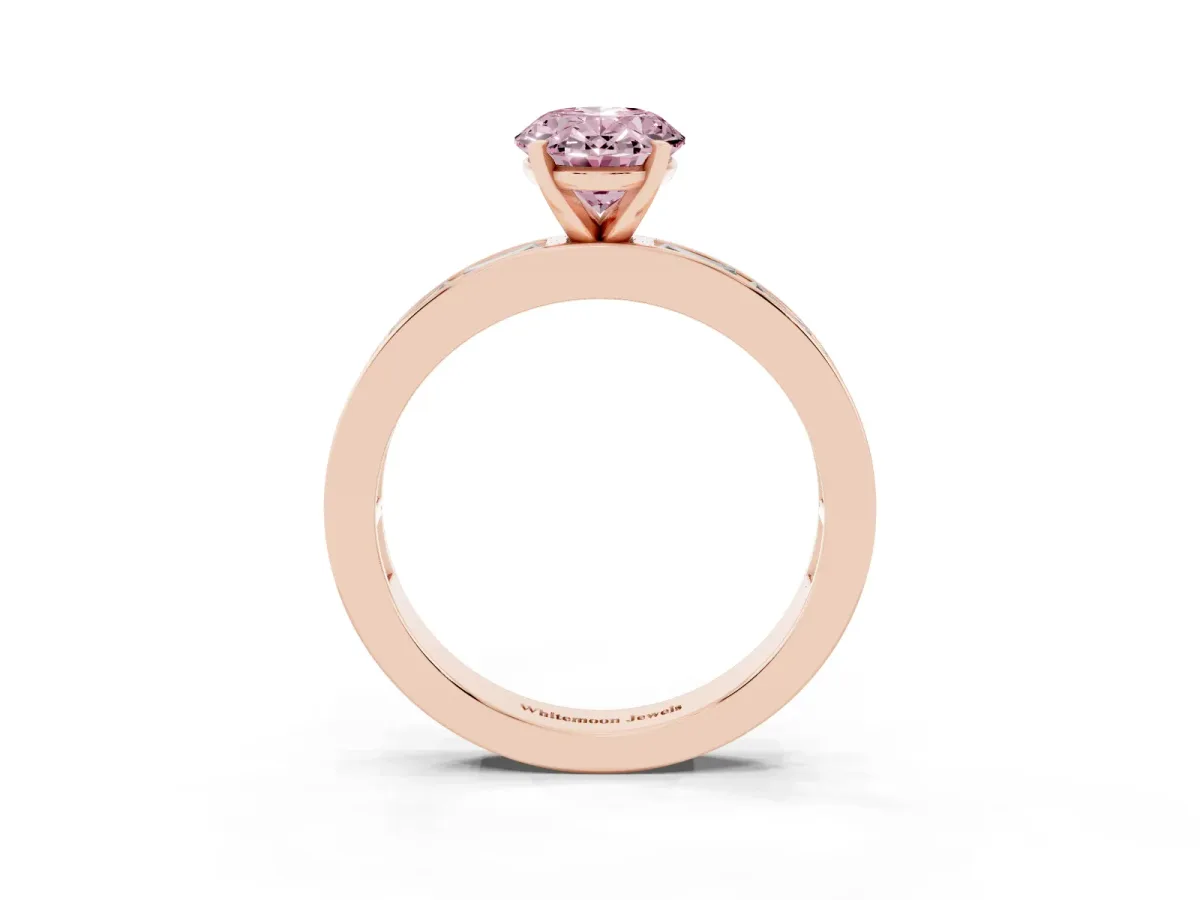 Fancy Pink Oval Cut Solitaire Diamond Ring with Channel-Set Baguette Band and Four-Prong Setting Rose gold