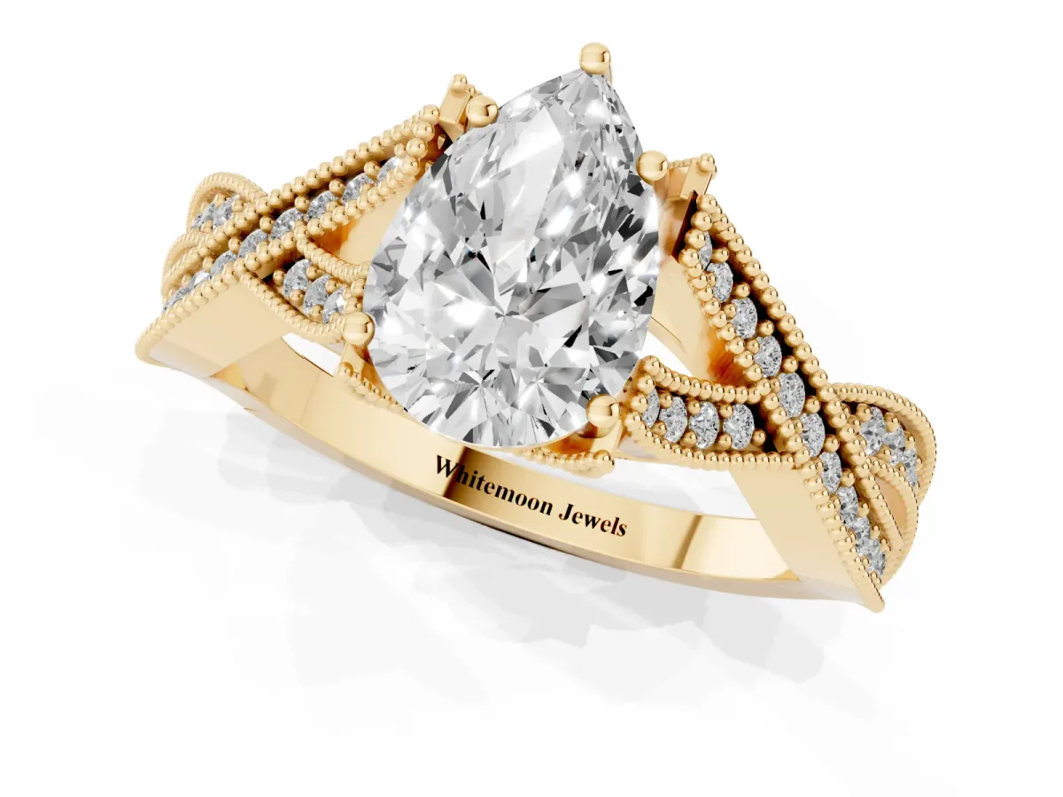 Pear Cut Cut Diamond Twisted Band with Milgrain Pave Setting and Four-Prong Setting Yellow gold