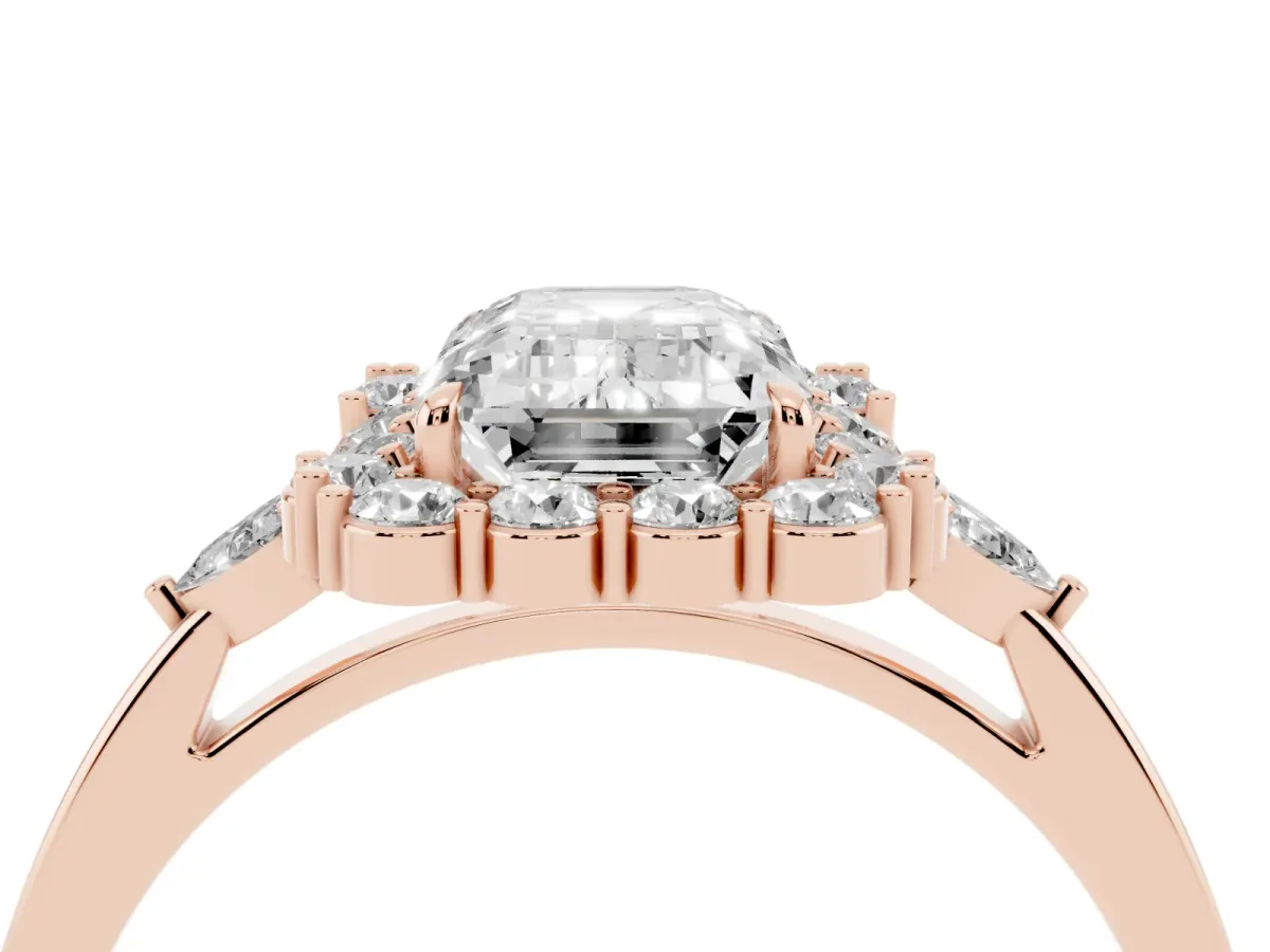 Emerald Cut Diamond Halo Ring with Pear Side Stones and Prong Setting Rose gold