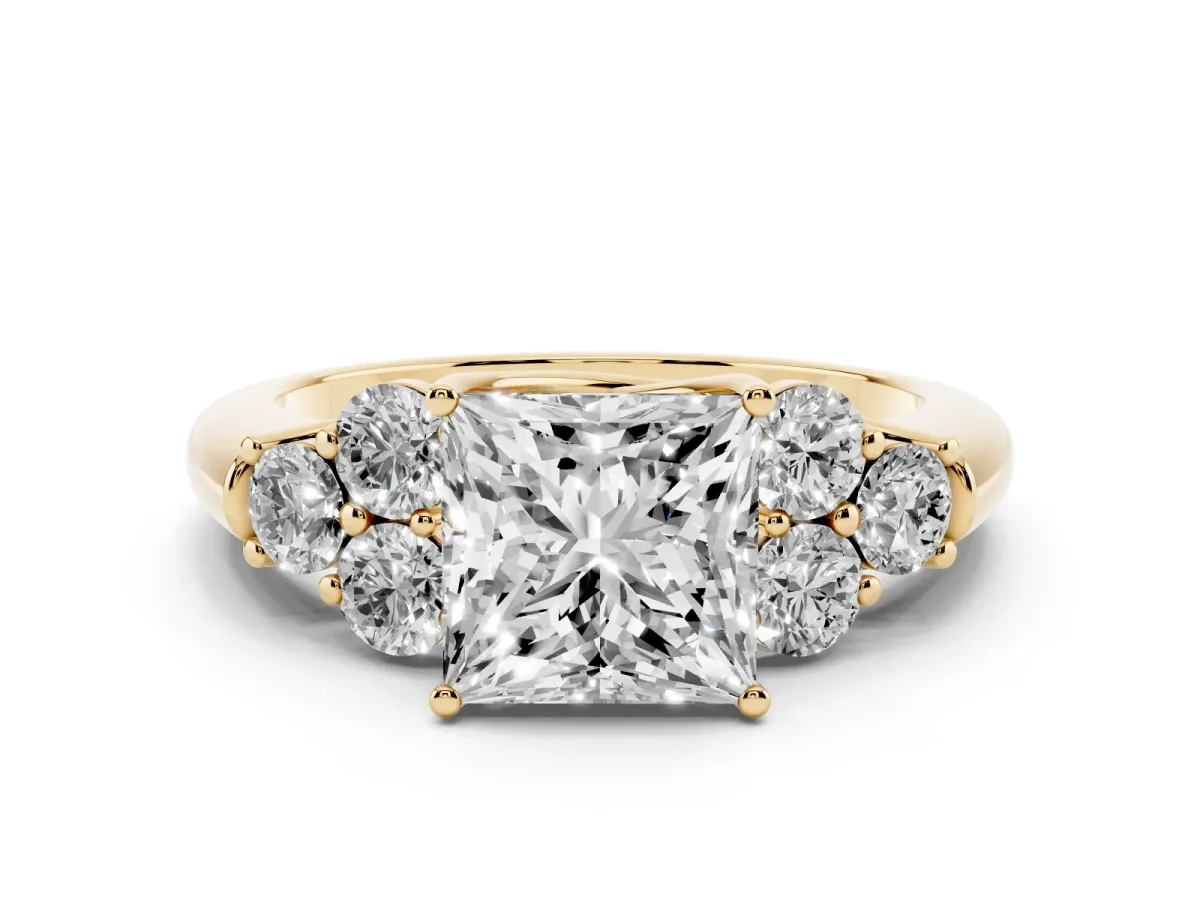 Princess Cut Cut Diamond Cluster Ring with Round Accent Stones and Prong Setting on a Classic Band Yellow gold