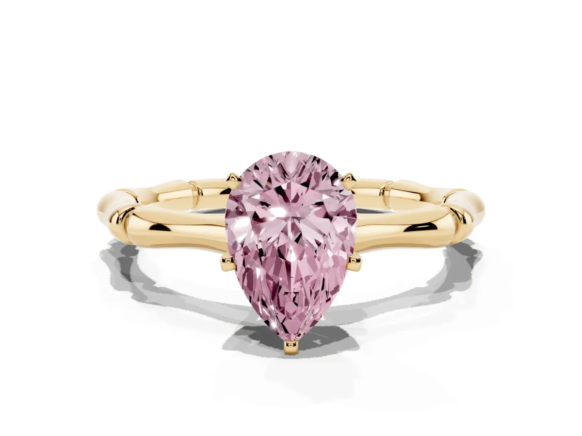 Fancy Pink Pear Cut Solitaire Diamond Ring with Bamboo Band and Four-Prong Setting Yellow gold