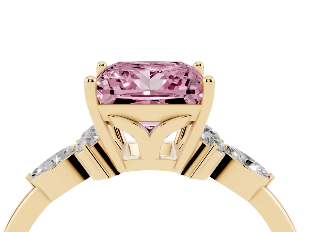 Fancy Pink Princess Cut Brilliant Diamond Solitaire Ring with Pear Side Stones and Four-Prong Setting Yellow gold