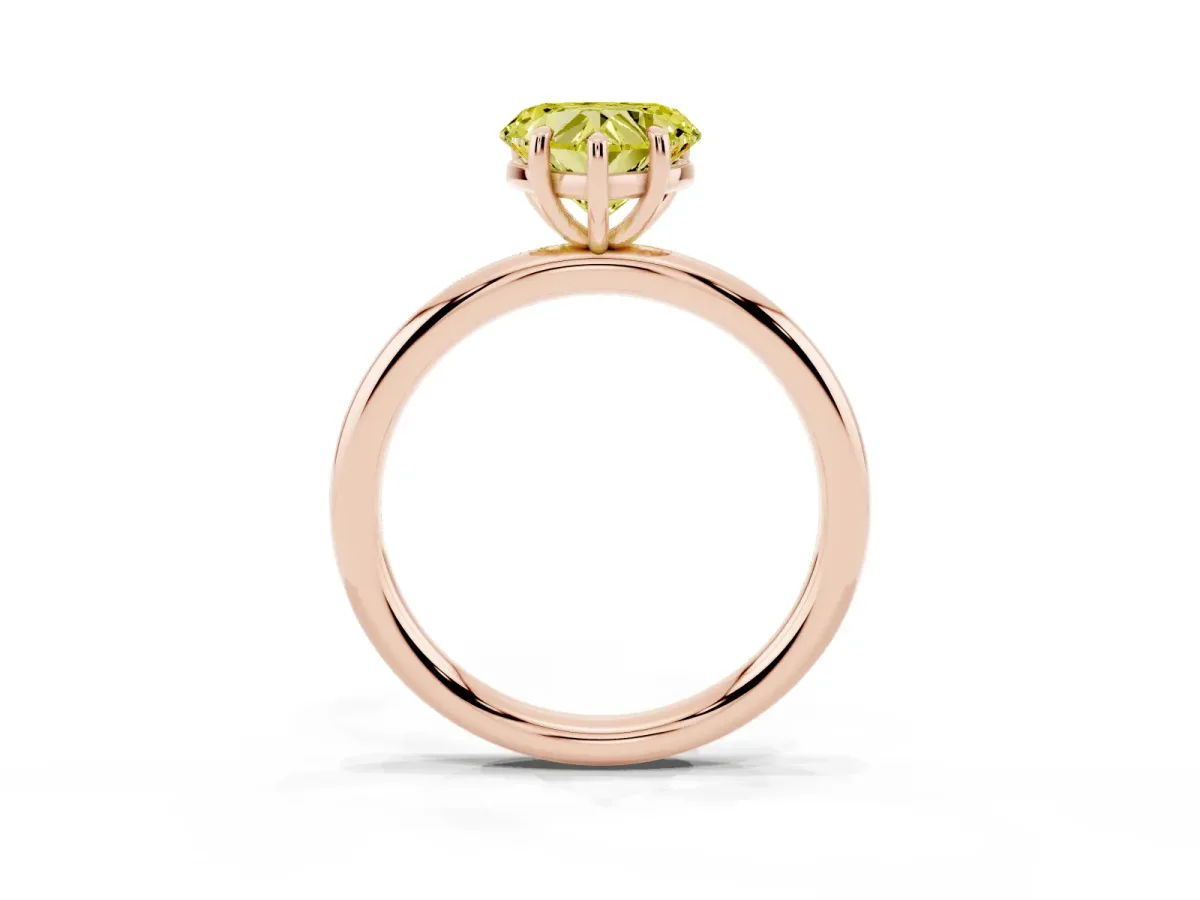 Fancy Yellow Heart Cut Solitaire Diamond Ring with Four-Prong Setting on a Plain Band Rose gold