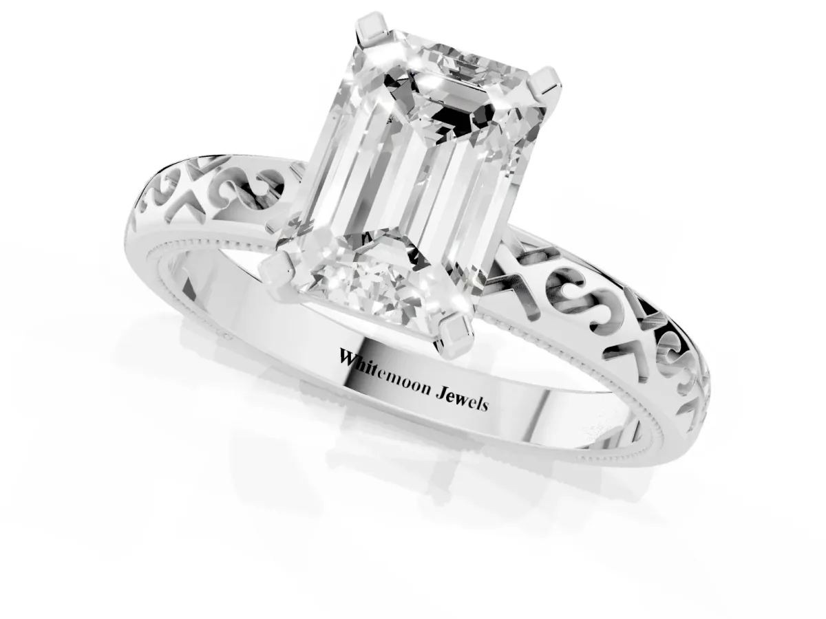 Emerald Cut Solitaire Engagement Ring with Scrollwork Band and Four-Prong Setting Platinum