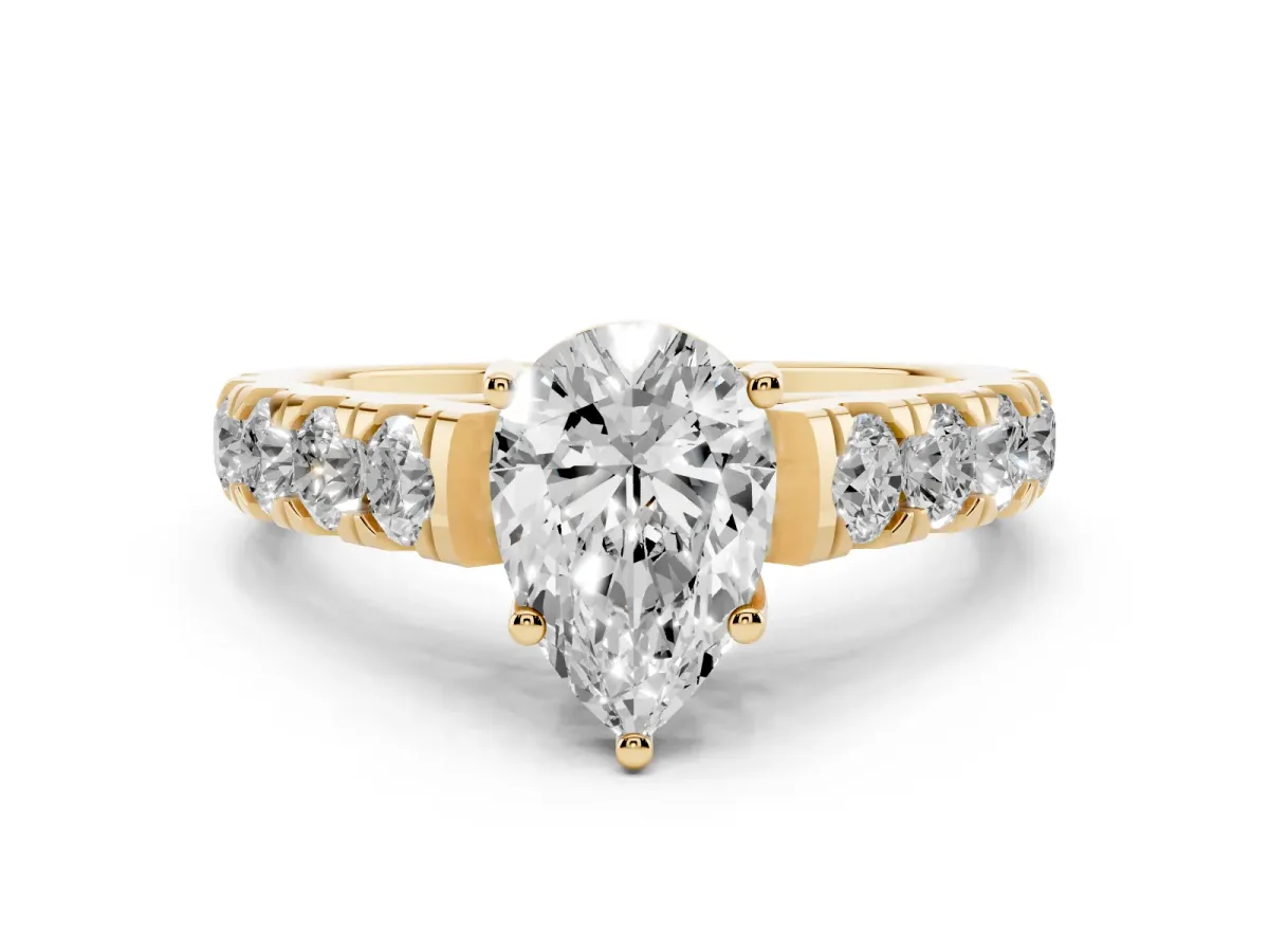 Pear Cut Cut Diamond Solitaire Ring with Micro Pave Band and Prong Setting Yellow gold