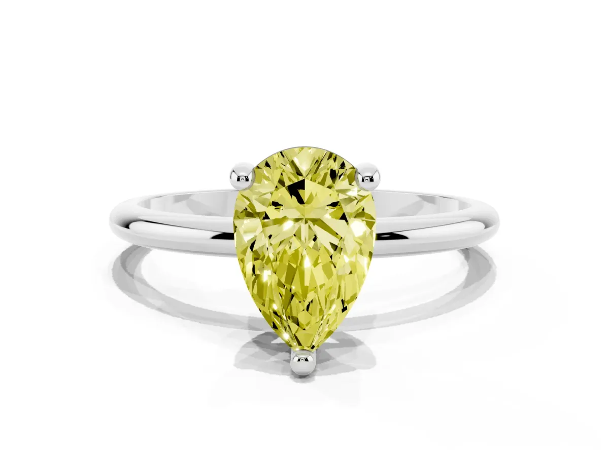 Fancy Yellow Pear Cut Solitaire Diamond Ring with 4-Prong Setting on a Classic Band Silver