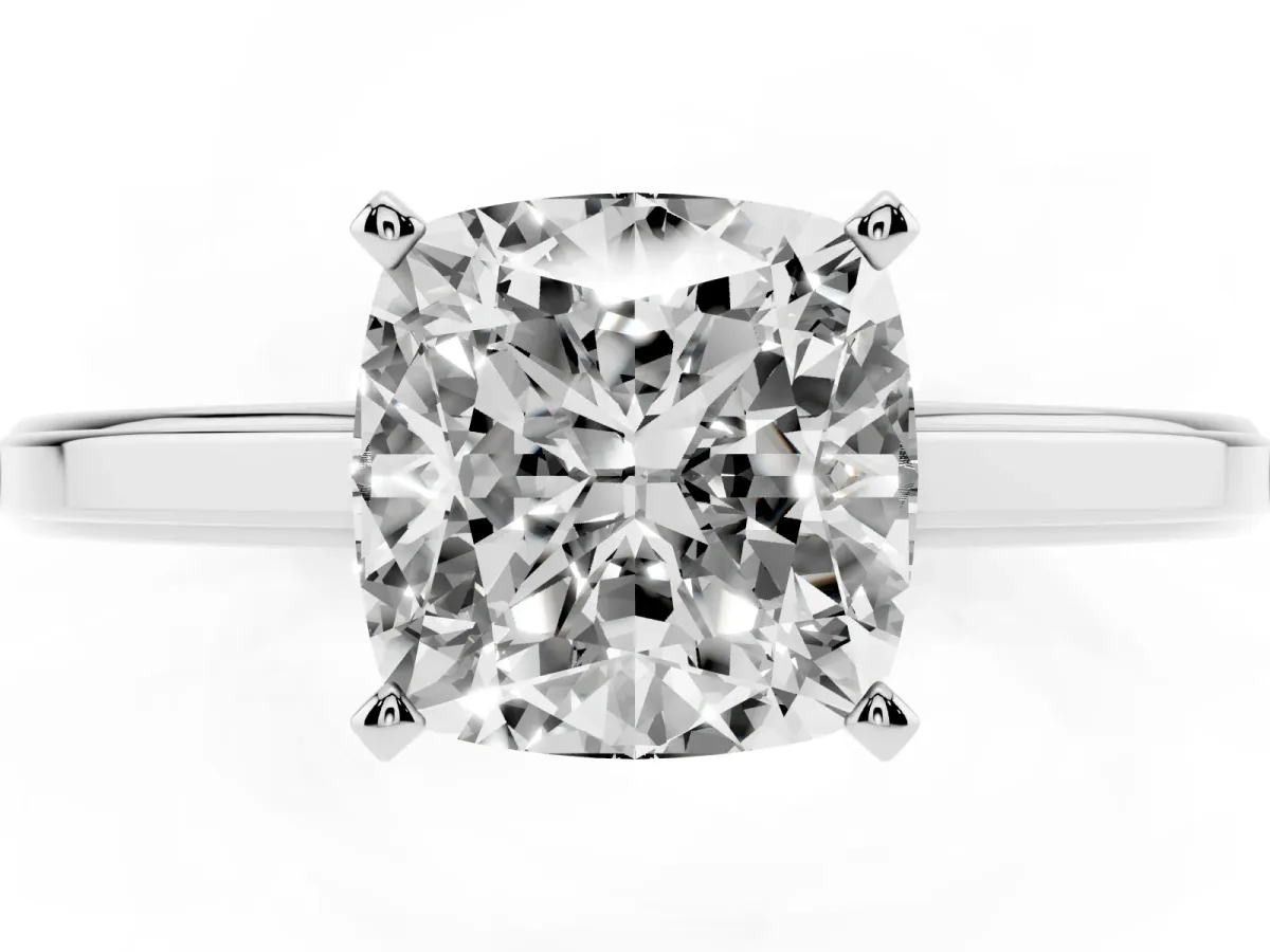 Cushion Cut Solitaire Diamond Ring with Four-Prong Setting and Classic Band Silver
