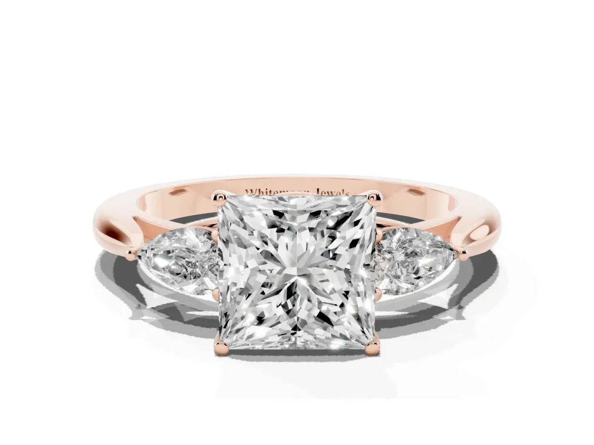 Three-Stone Princess Cut Diamond Ring with Pear Side Stones in Four-Prong Setting Rose gold
