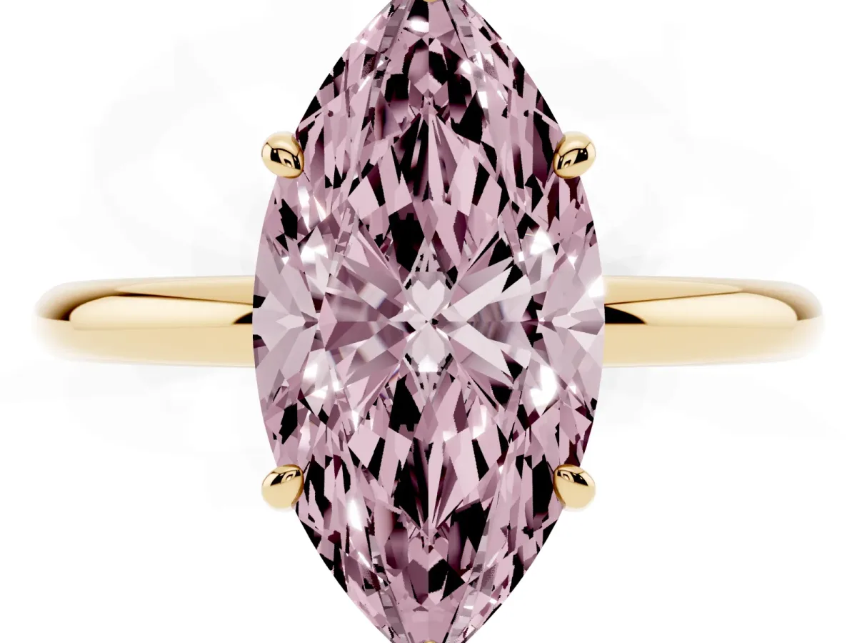Fancy Pink Oval Cut Solitaire Diamond Ring with Four-Prong Setting on a Plain Band Yellow gold