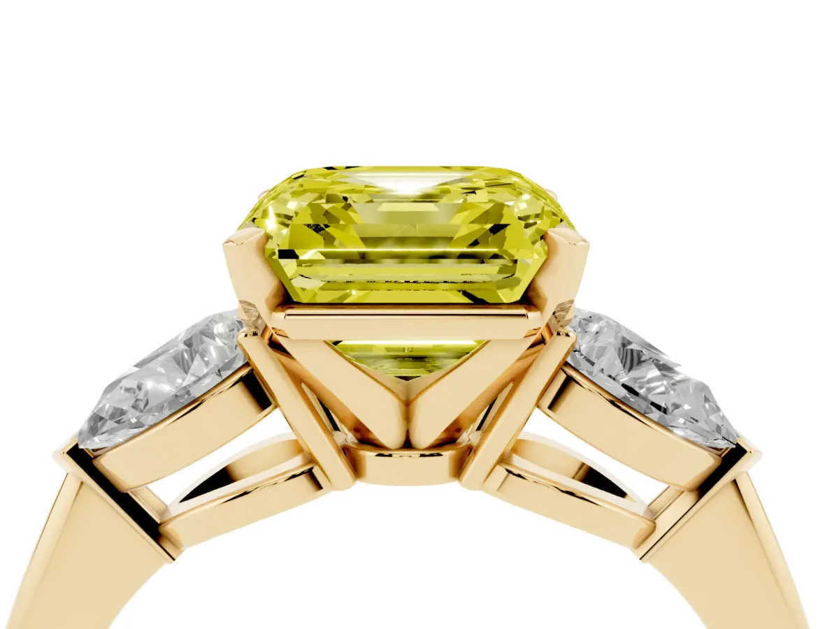 Fancy Yellow Three-Stone Asscher Cut Diamond Ring with Pear Side Stones and Four-Prong Setting Yellow gold