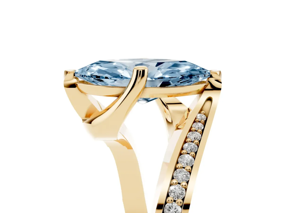 Fancy Blue Marquise Cut Solitaire Diamond Twist Band with Pavé Setting and Four-Prong Setting Yellow gold
