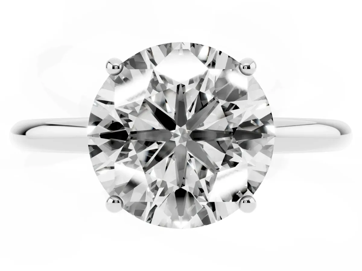 Round Cut Solitaire Diamond Ring with a Classic Band and Four-Prong Setting Platinum