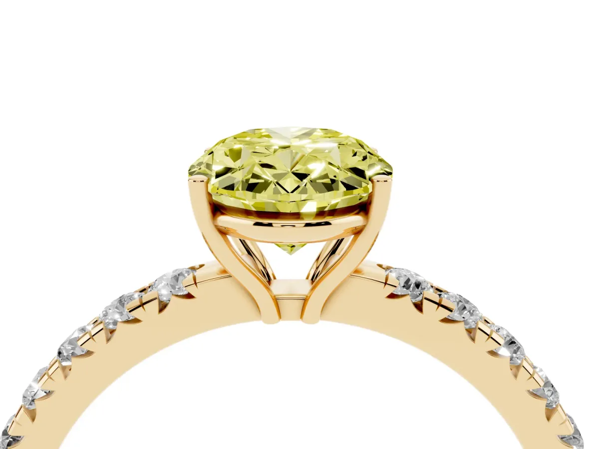 Fancy Yellow Oval Cut Diamond Pavé Solitaire Engagement Ring with Four-Prong Setting Yellow gold