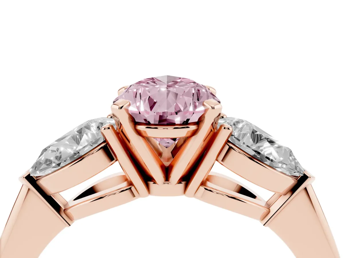 Fancy Pink Three-Stone Pear Cut Diamond Ring with Pear Side Stones and Four-Prong Setting Rose gold