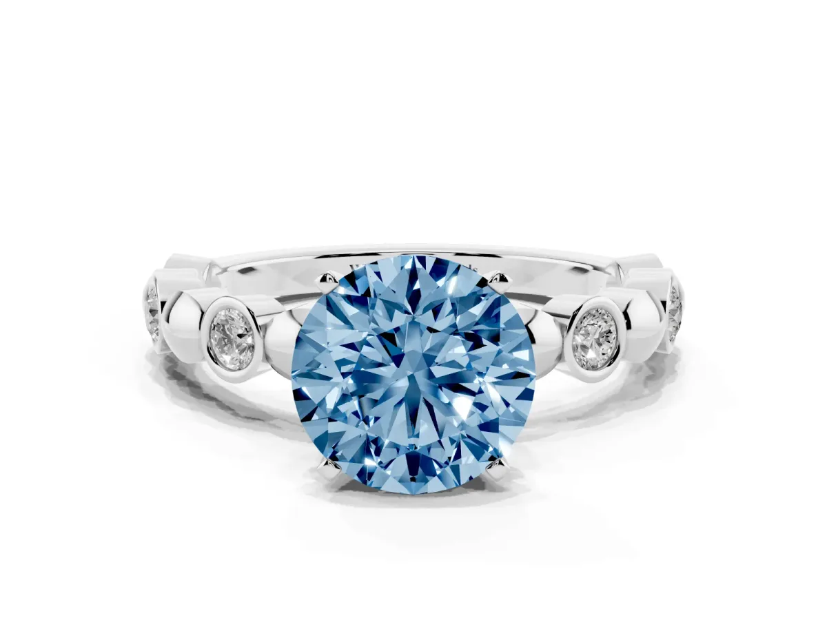 Fancy Blue Round Cut Solitaire Bezel-Set Diamond Ring with Beaded Band and Four-Prong Setting Silver