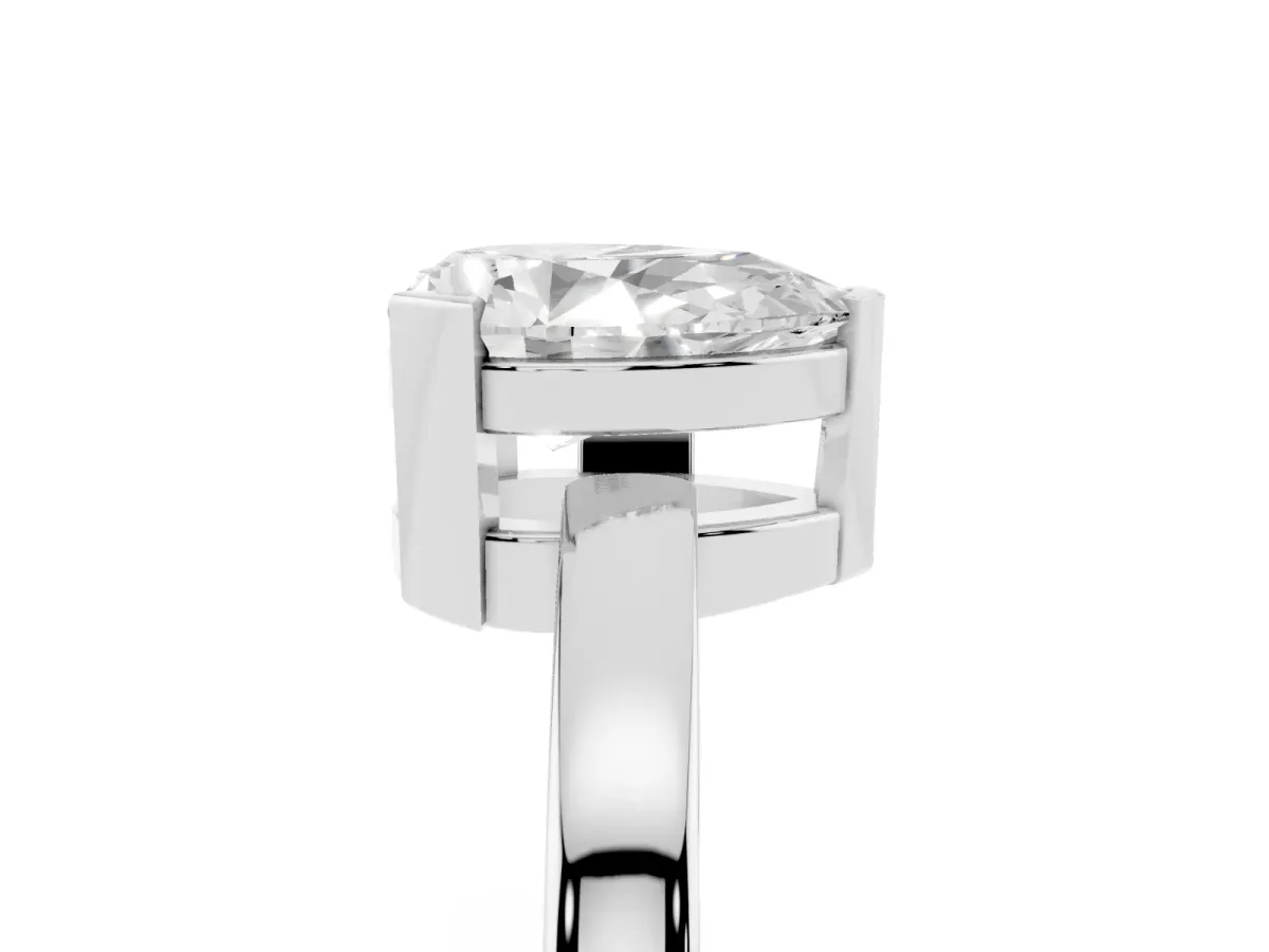 Pear Cut Cut Solitaire Ring with Four-Prong Setting and Classic Band Platinum