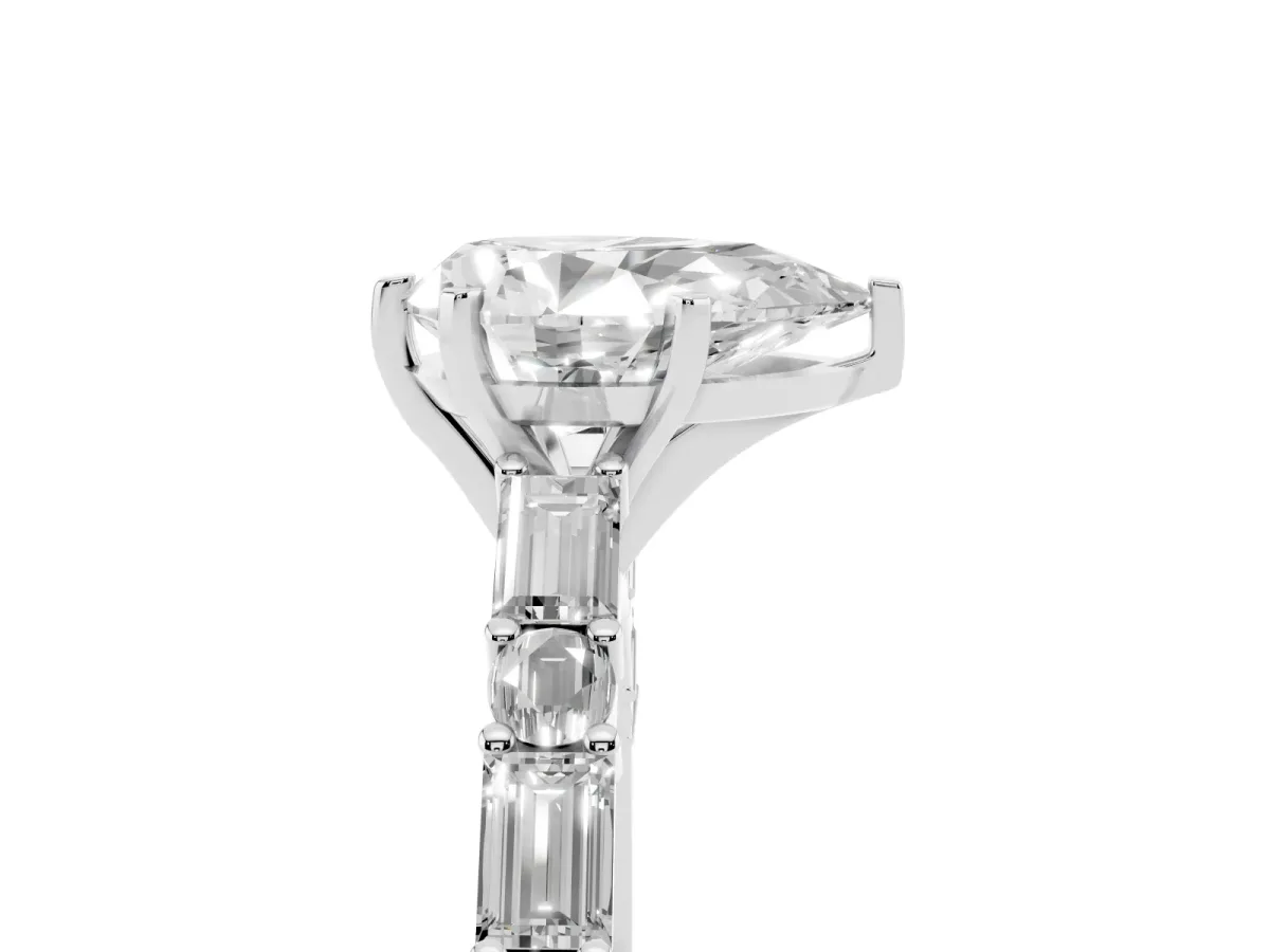 Pear Cut Diamond Solitaire with Side Baguettes and Channel Set Band Platinum