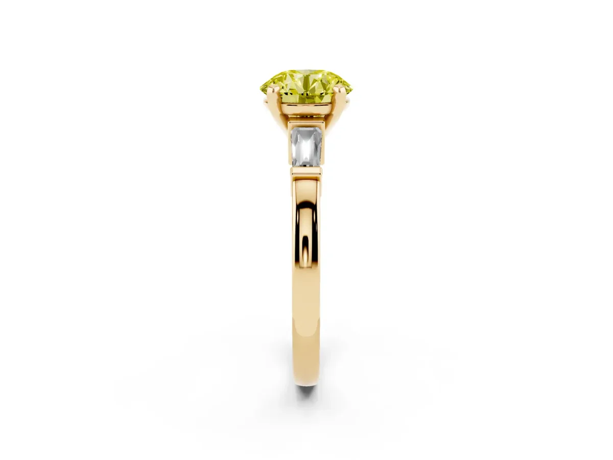 Fancy Yellow Round Cut Cut Diamond Solitaire Ring with Tapered Baguette Accents and Four-Prong Setting Yellow gold