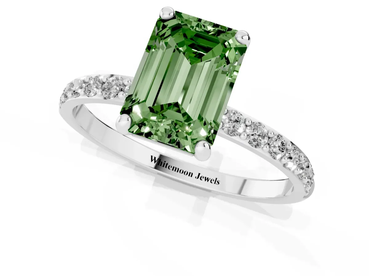 Fancy Green Emerald Cut Diamond Solitaire Ring with Round Pavé Band and Prong Setting Silver