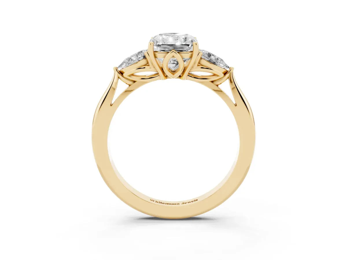 Radiant Cut Diamond Three-Stone Ring with Pear Side Stones and Prong Setting Yellow gold