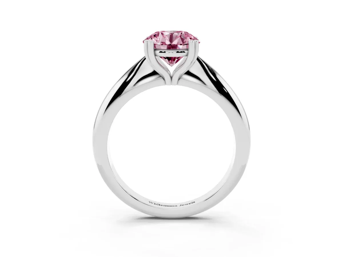 Fancy Pink Round Cut Cut Solitaire Engagement Ring with Tapered Band and Four-Prong Setting Silver