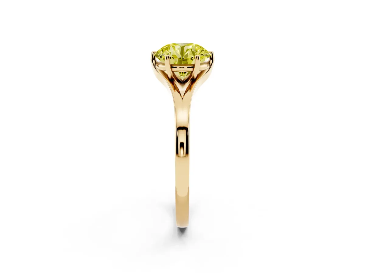 Fancy Yellow Round Cut Solitaire Diamond Ring with Six-Prong Setting and Tapered Band Yellow gold