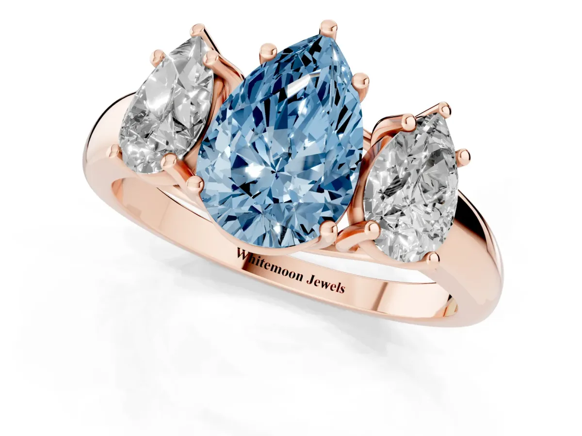 Fancy Blue Three-Stone Pear Cut Diamond Engagement Ring with Prong Setting Rose gold