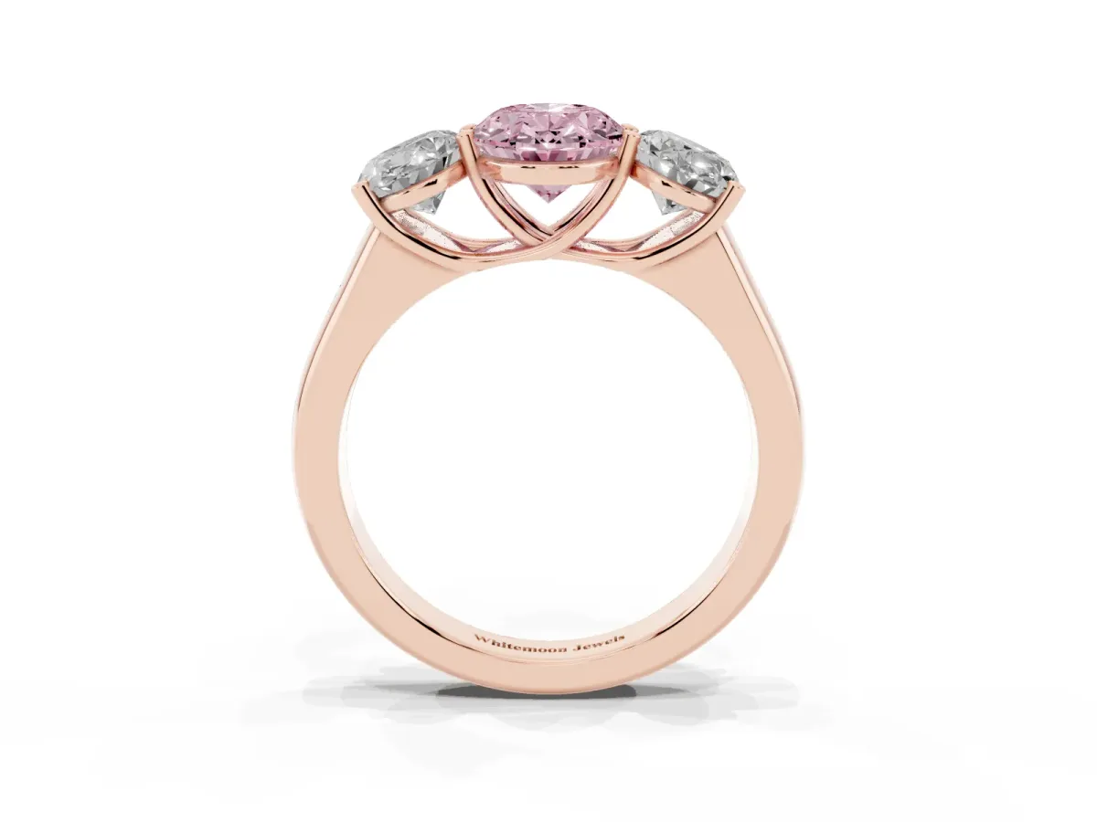 Fancy Pink Oval Cut Three-Stone Diamond Ring with Prong Setting on a Classic Band Rose gold