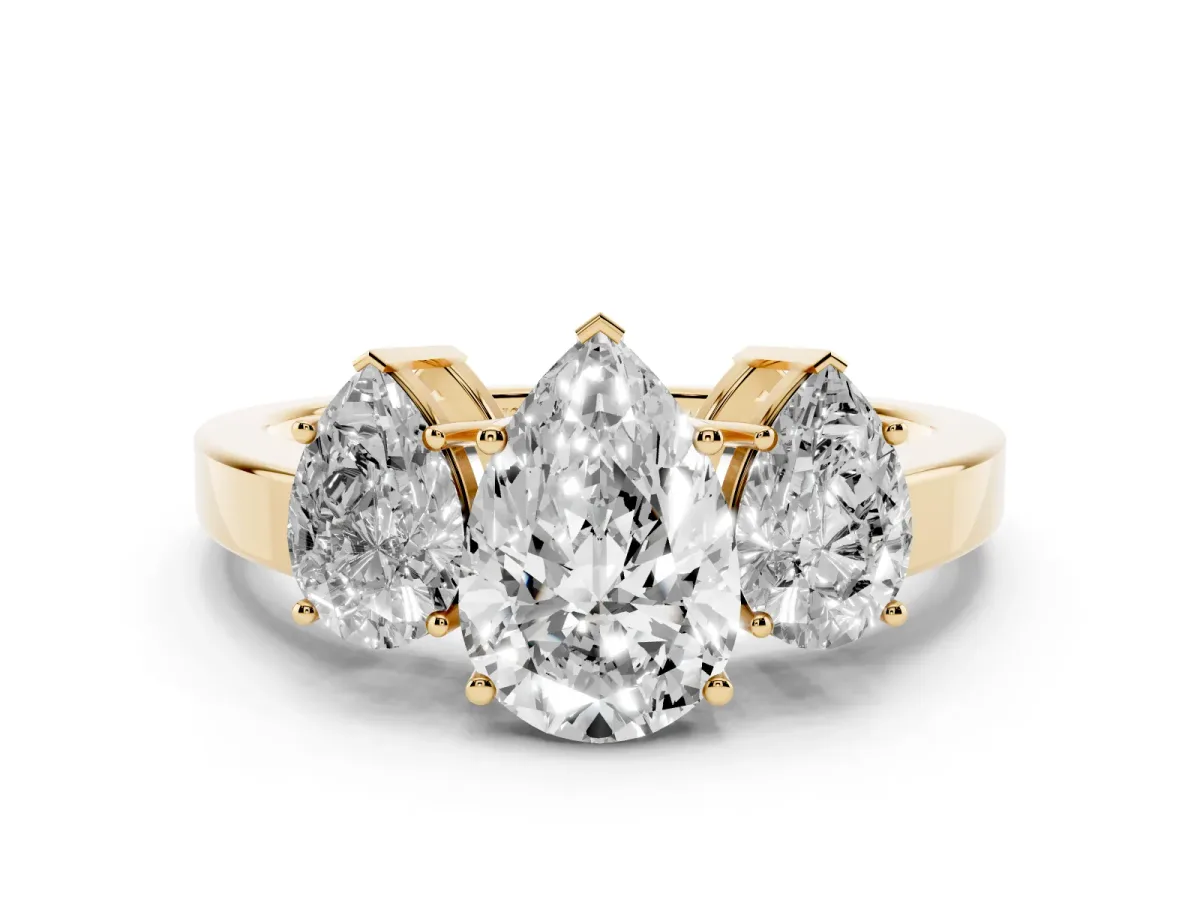 Three-Stone Pear Cut Cut Diamond Engagement Ring with Flat Band and Four-Prong Setting Yellow gold