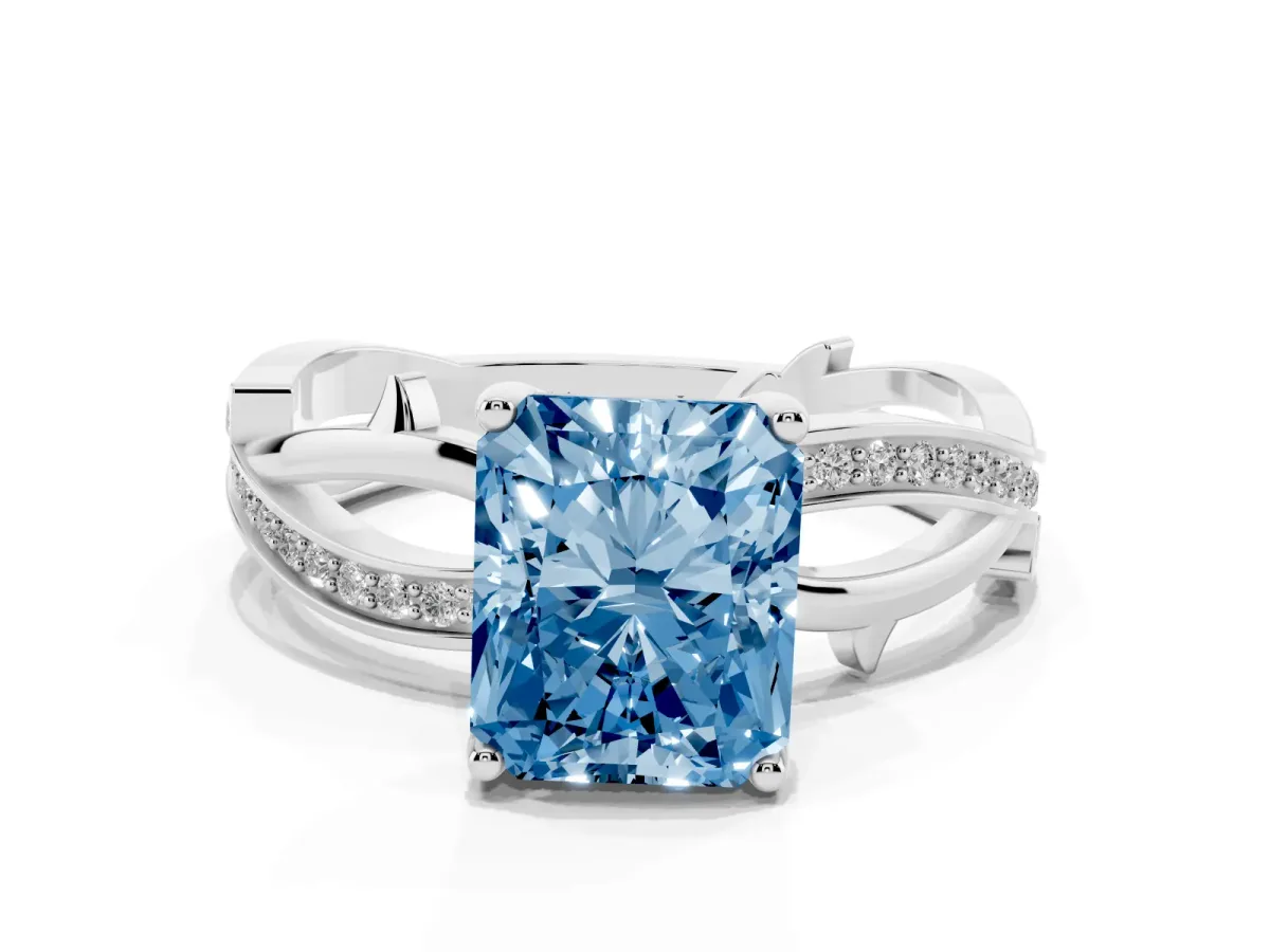 Fancy Blue Radiant Cut Solitaire Twist Band with Pavé Accents and Four-Prong Setting Silver