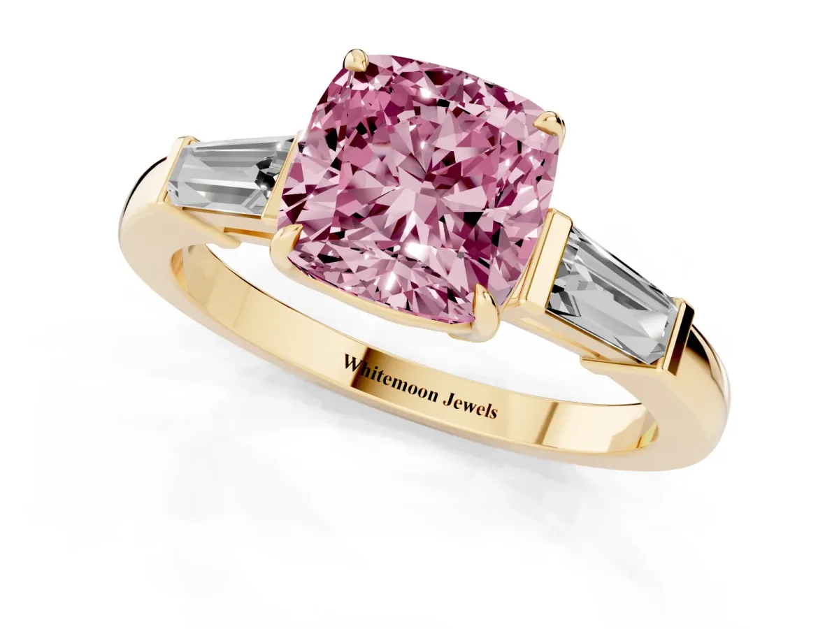 Fancy Pink Cushion Cut Diamond Three-Stone Ring with Tapered Baguette Side Stones and Prong Setting Yellow gold