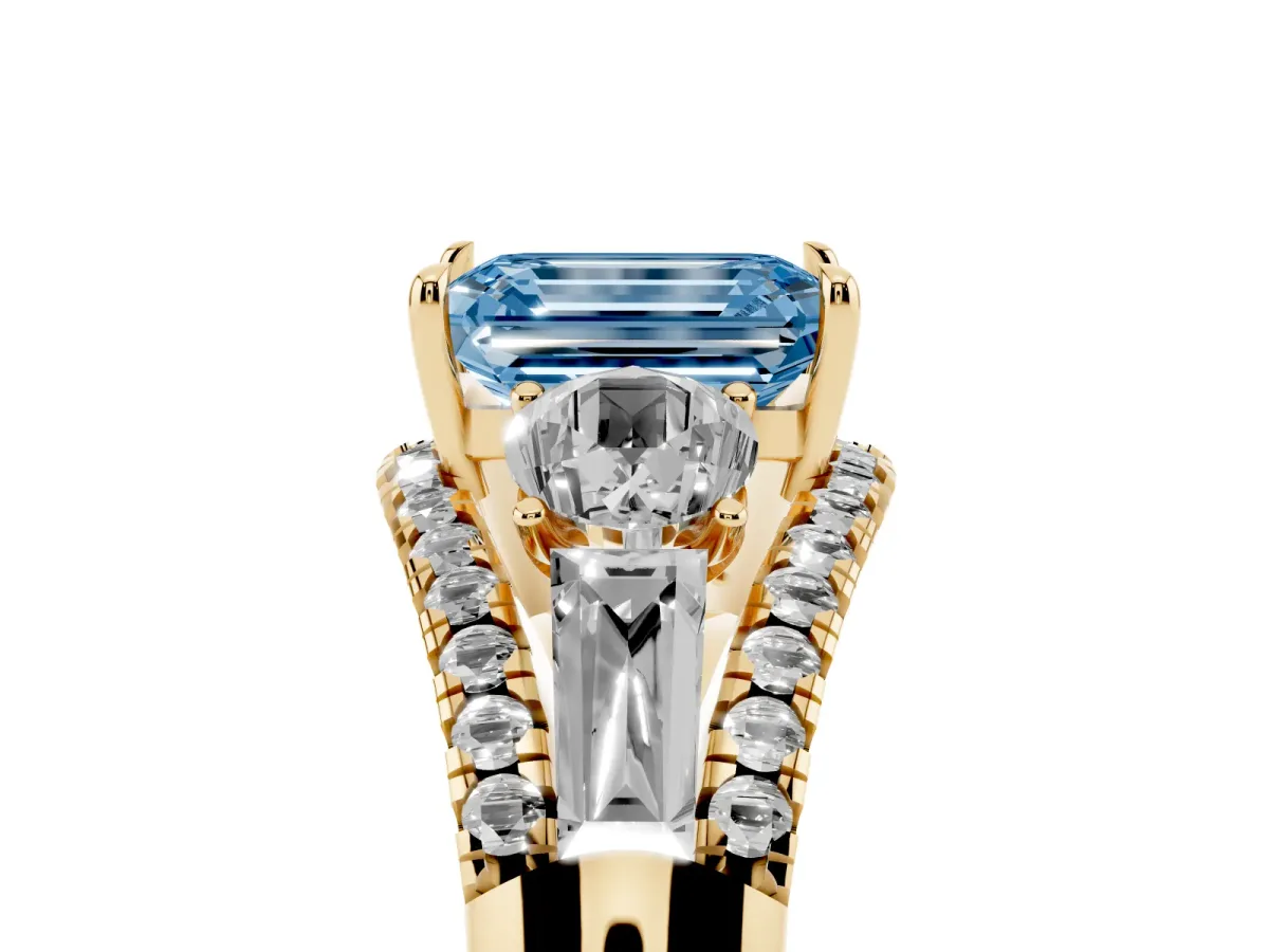 Fancy Blue Three-Stone Emerald Cut Diamond Engagement Ring with Pave Band and Prong Setting Yellow gold