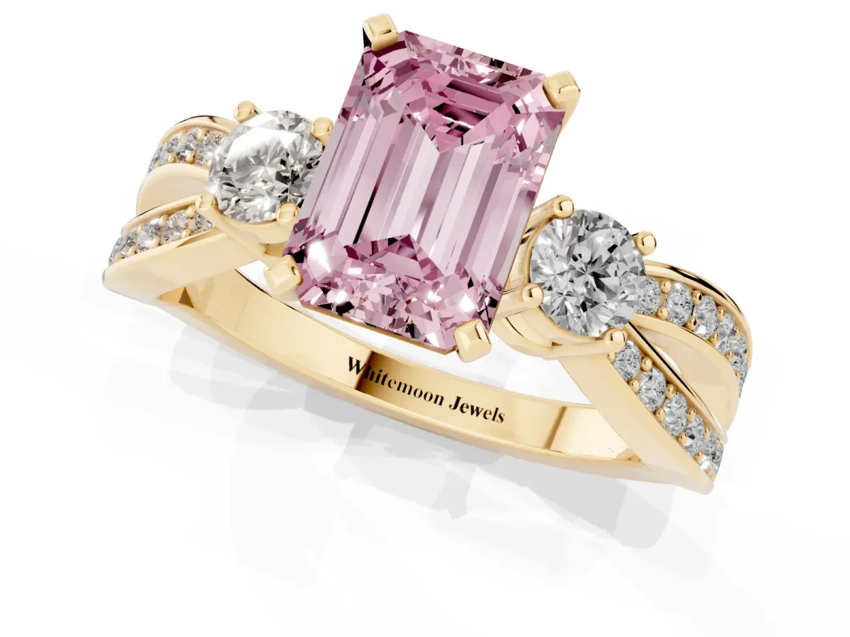 Fancy Pink Three-Stone Emerald Cut Cut Diamond Twist Band with Prong Setting Yellow gold
