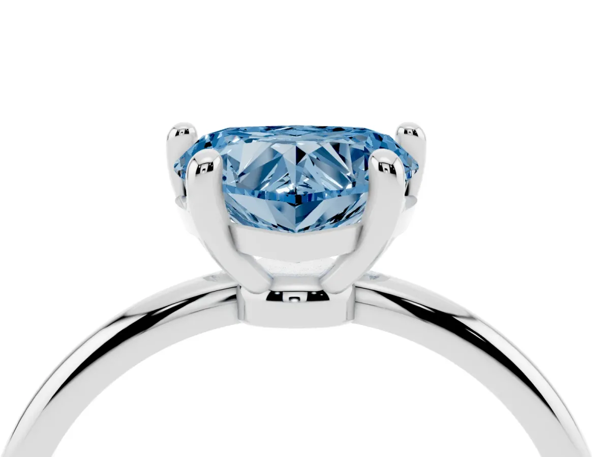 Fancy Blue Heart Cut Solitaire Diamond Ring with 4-Prong Setting on a Classic Band Silver