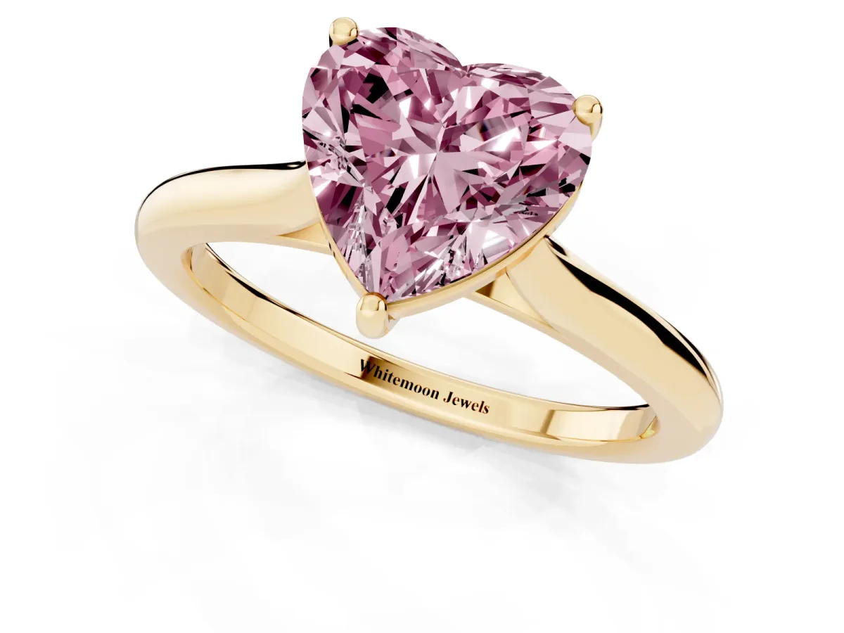 Fancy Pink Heart Cut Cut Solitaire Ring with Cathedral Band and Four-Prong Setting Yellow gold