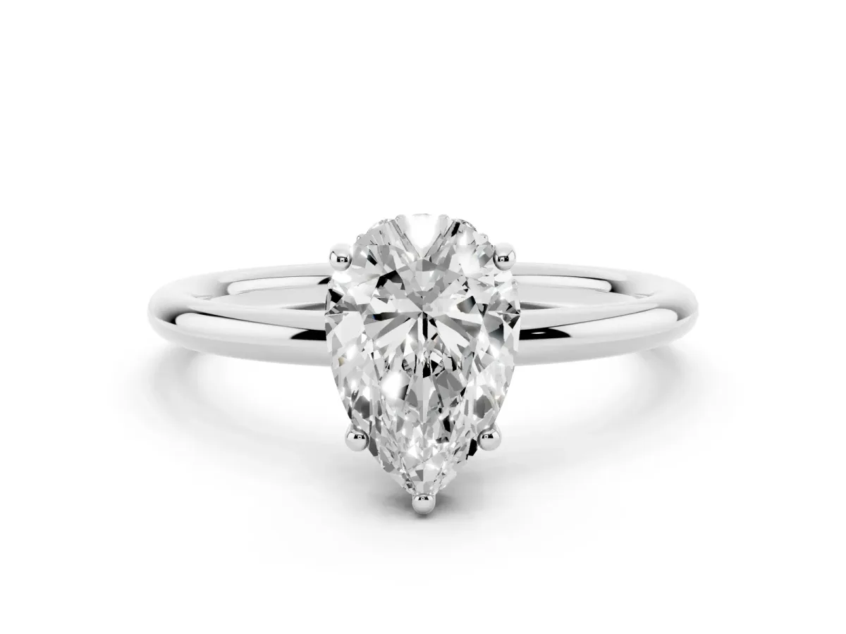 Pear Cut Solitaire Diamond Ring with a Classic Band and Four-Prong Setting Platinum