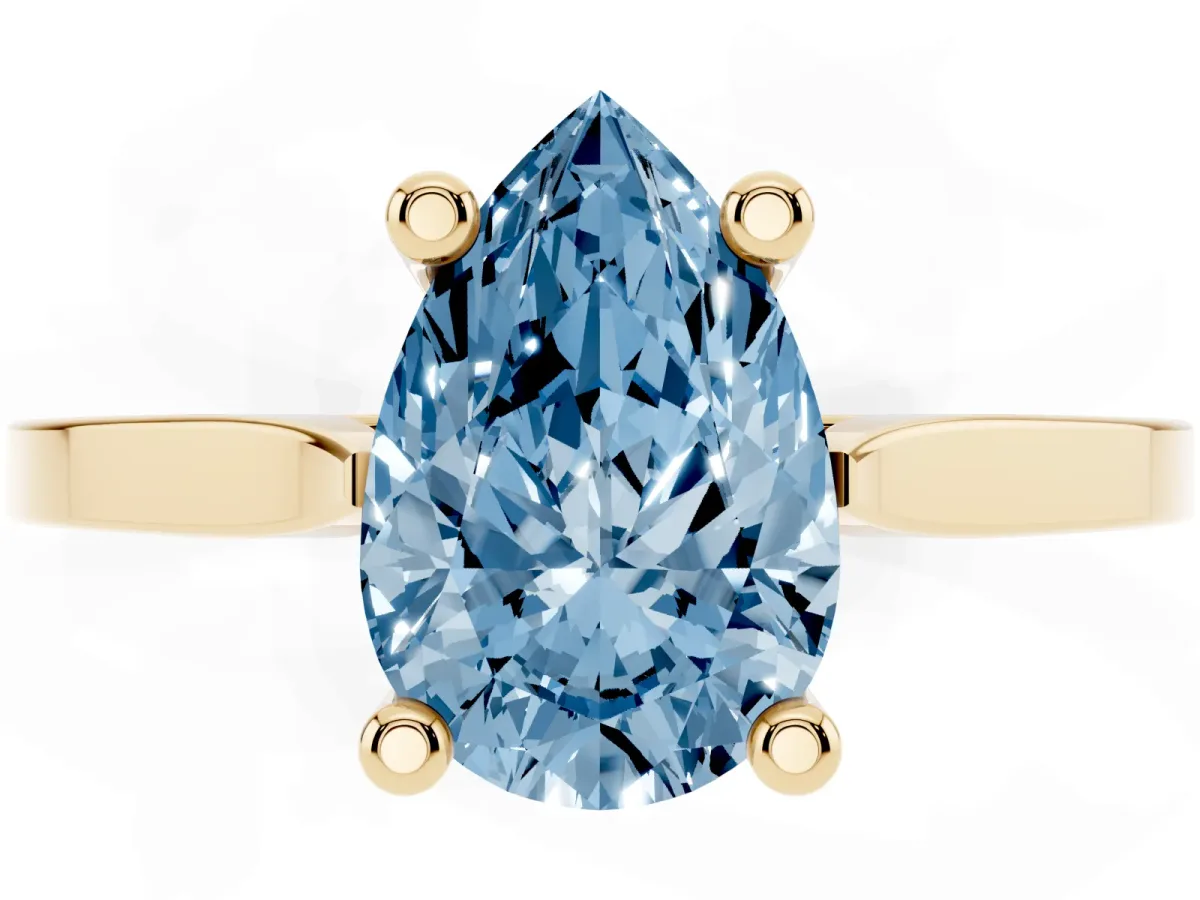 Fancy Blue Pear Cut Solitaire Diamond Ring with Four-Prong Setting and Tapered Band Yellow gold