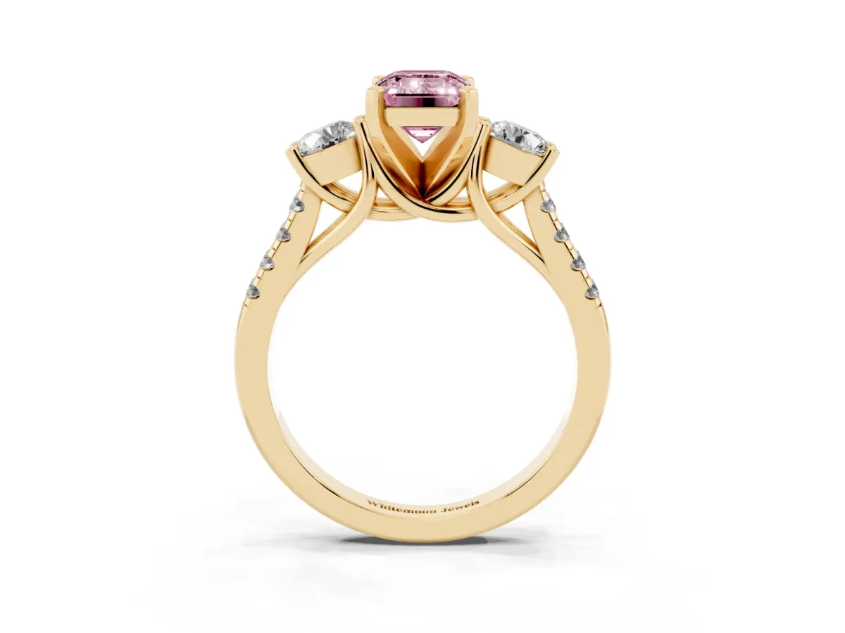 Fancy Pink Three-Stone Emerald Cut Diamond Pavé Band with Four-Prong Setting Yellow gold