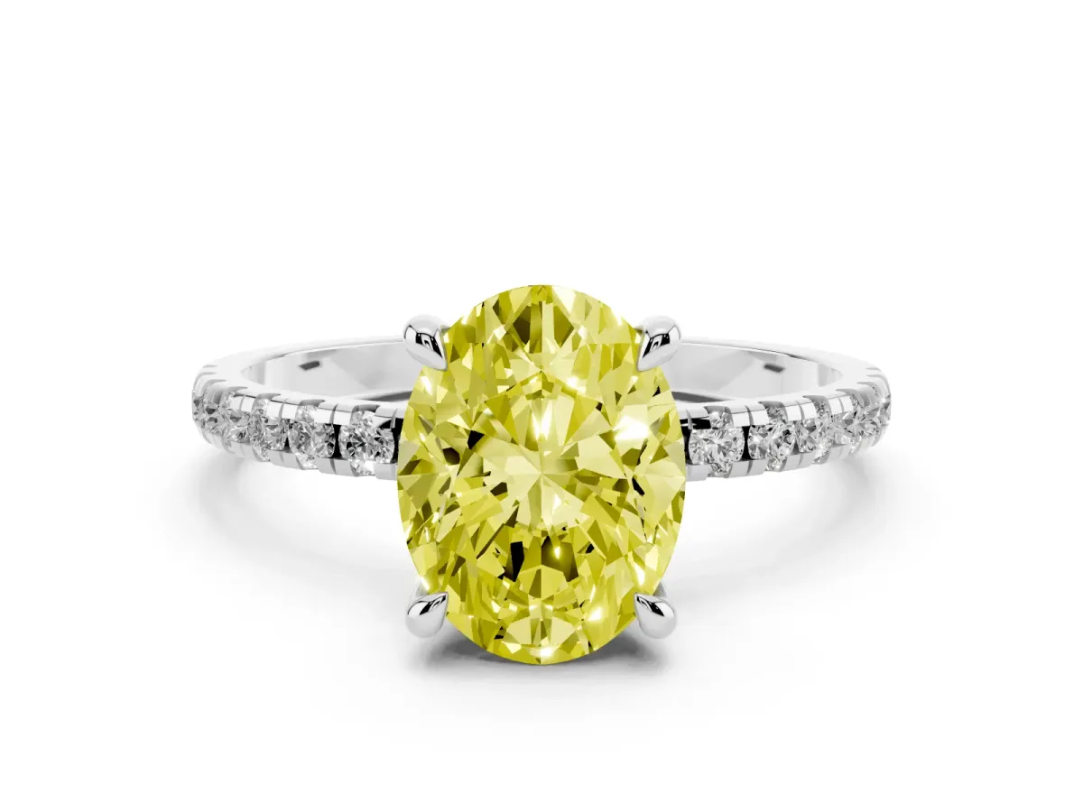 Fancy Yellow Oval Cut Diamond Brilliant Solitaire Ring with Pavé Band and Four-Prong Setting Silver