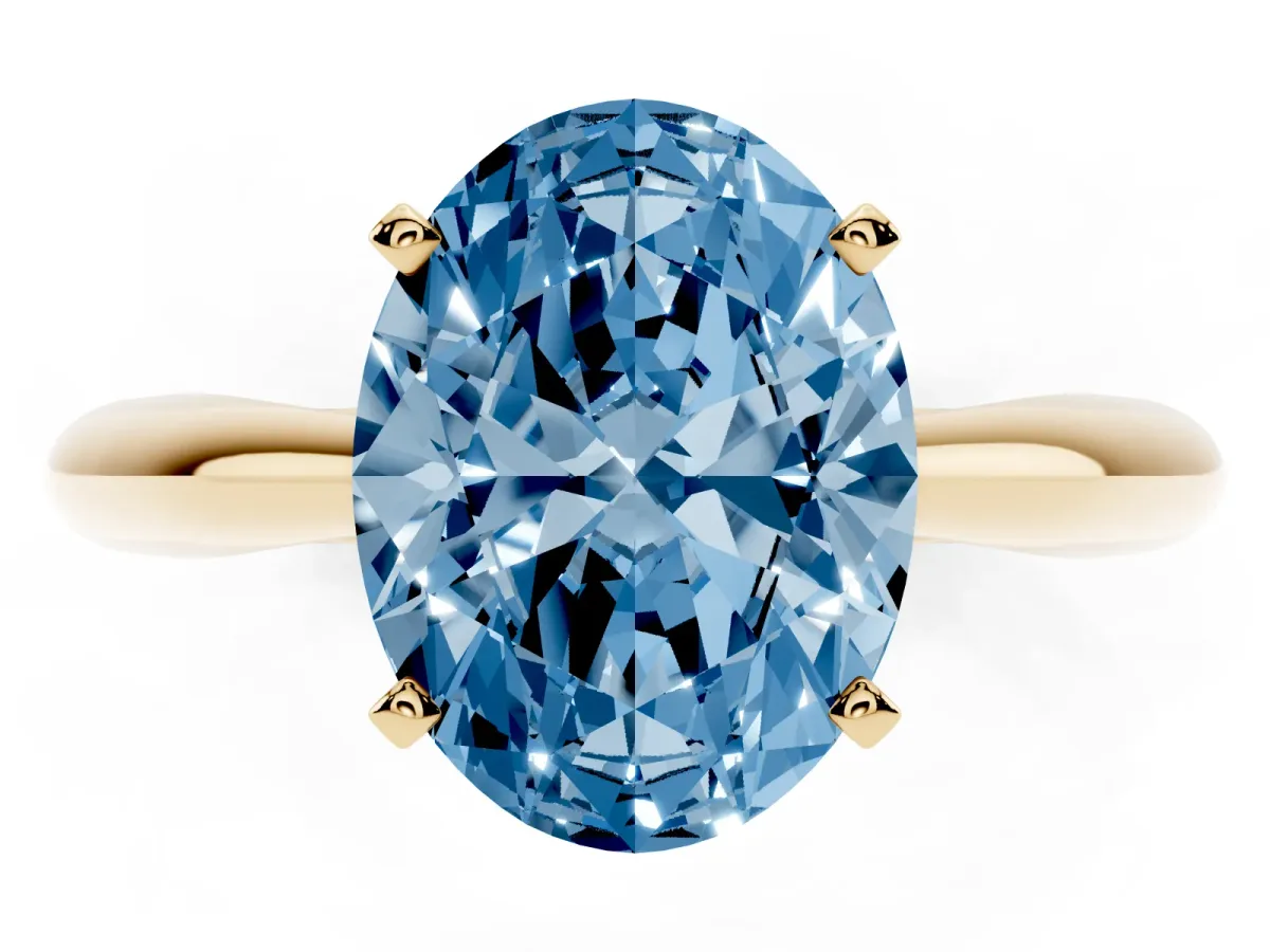 Fancy Blue Oval Cut Diamond Solitaire Engagement Ring with Cathedral Setting and Four-Prong Mount Yellow gold