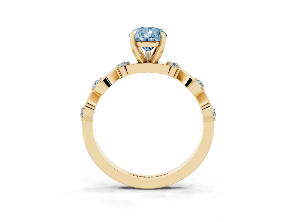 Fancy Blue Pear Cut Diamond Solitaire Twisted Band with Round Accents and Prong Setting Yellow gold