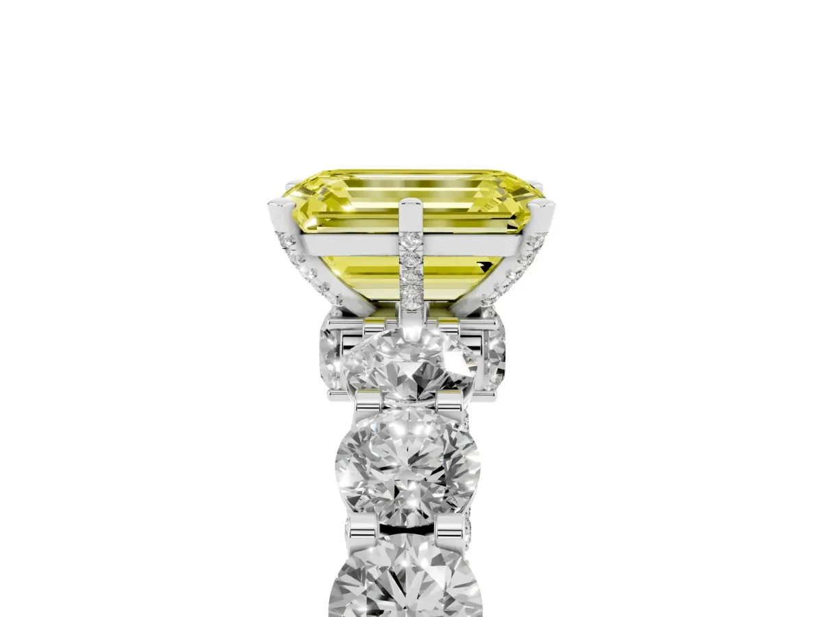 Fancy Yellow Emerald Cut Diamond Side Stone Engagement Ring with Four-Prong Setting Silver