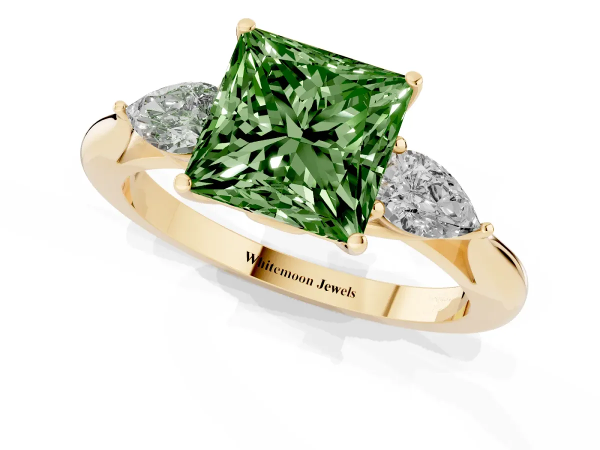 Fancy Green Three-Stone Princess Cut Diamond Ring with Pear Side Stones in Four-Prong Setting Yellow gold