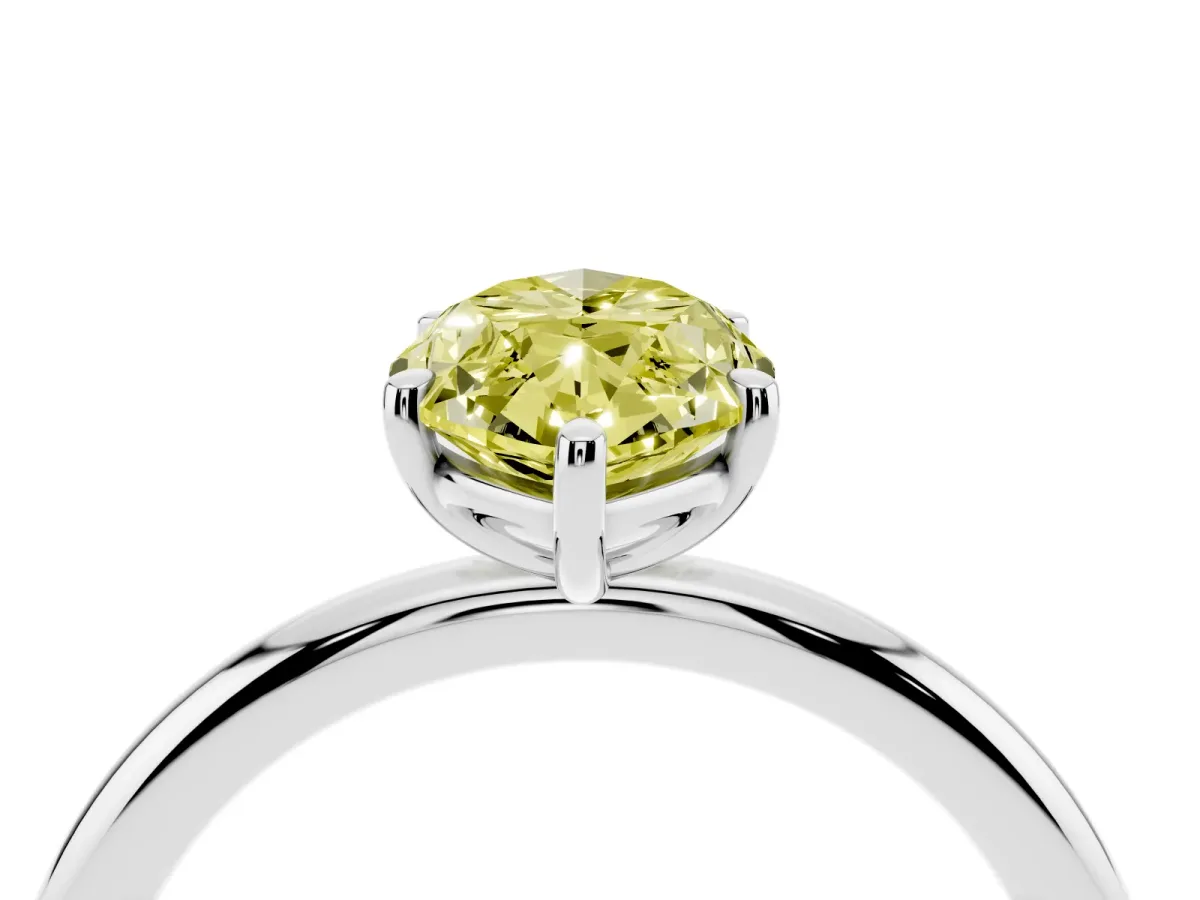 Fancy Yellow Marquise Cut Solitaire Diamond Ring with Four-Prong Setting on a Plain Band Platinum