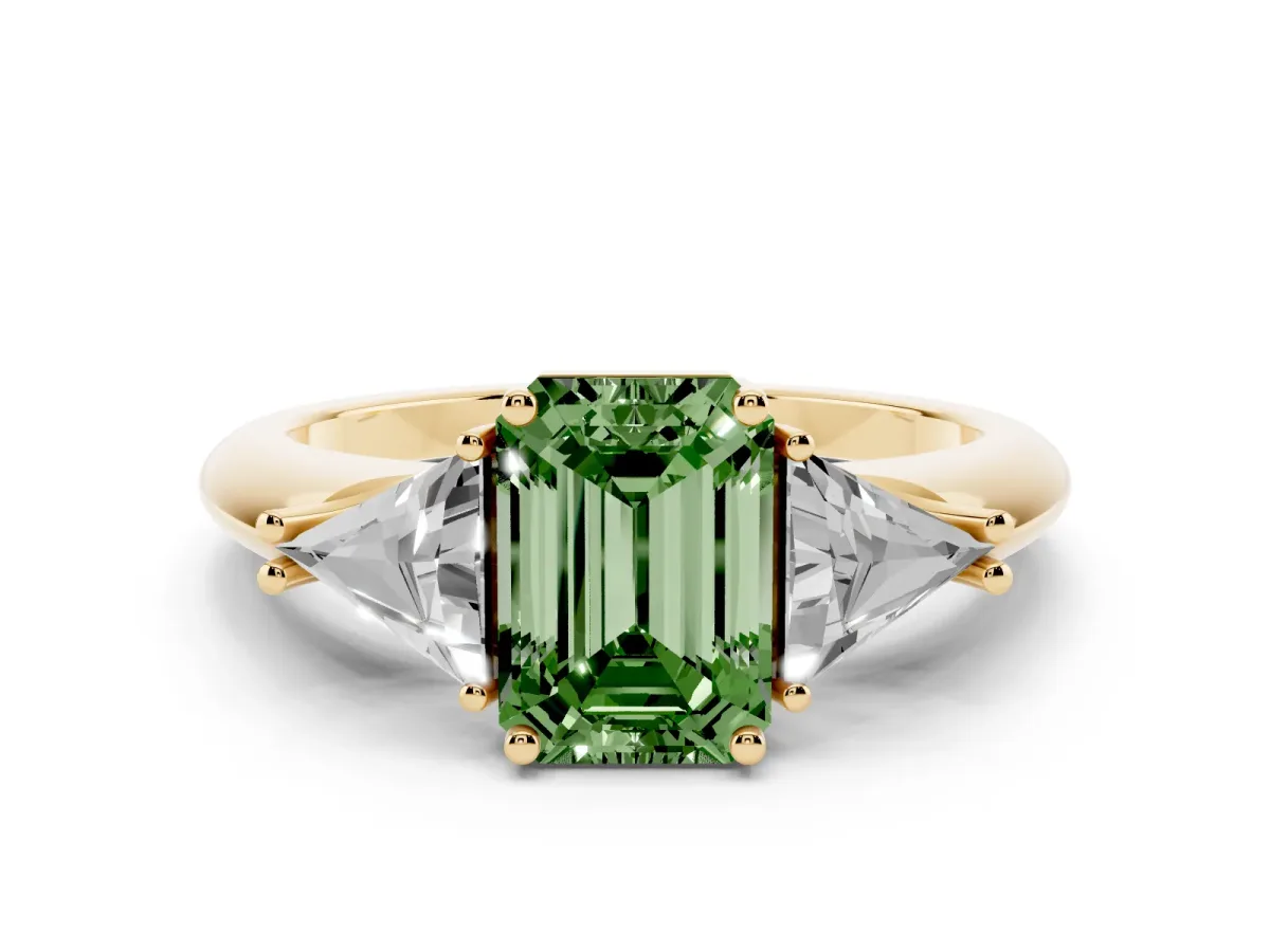 Fancy Green Three-Stone Emerald Cut Diamond Engagement Ring with Trillion Side Stones and Prong Setting Yellow gold