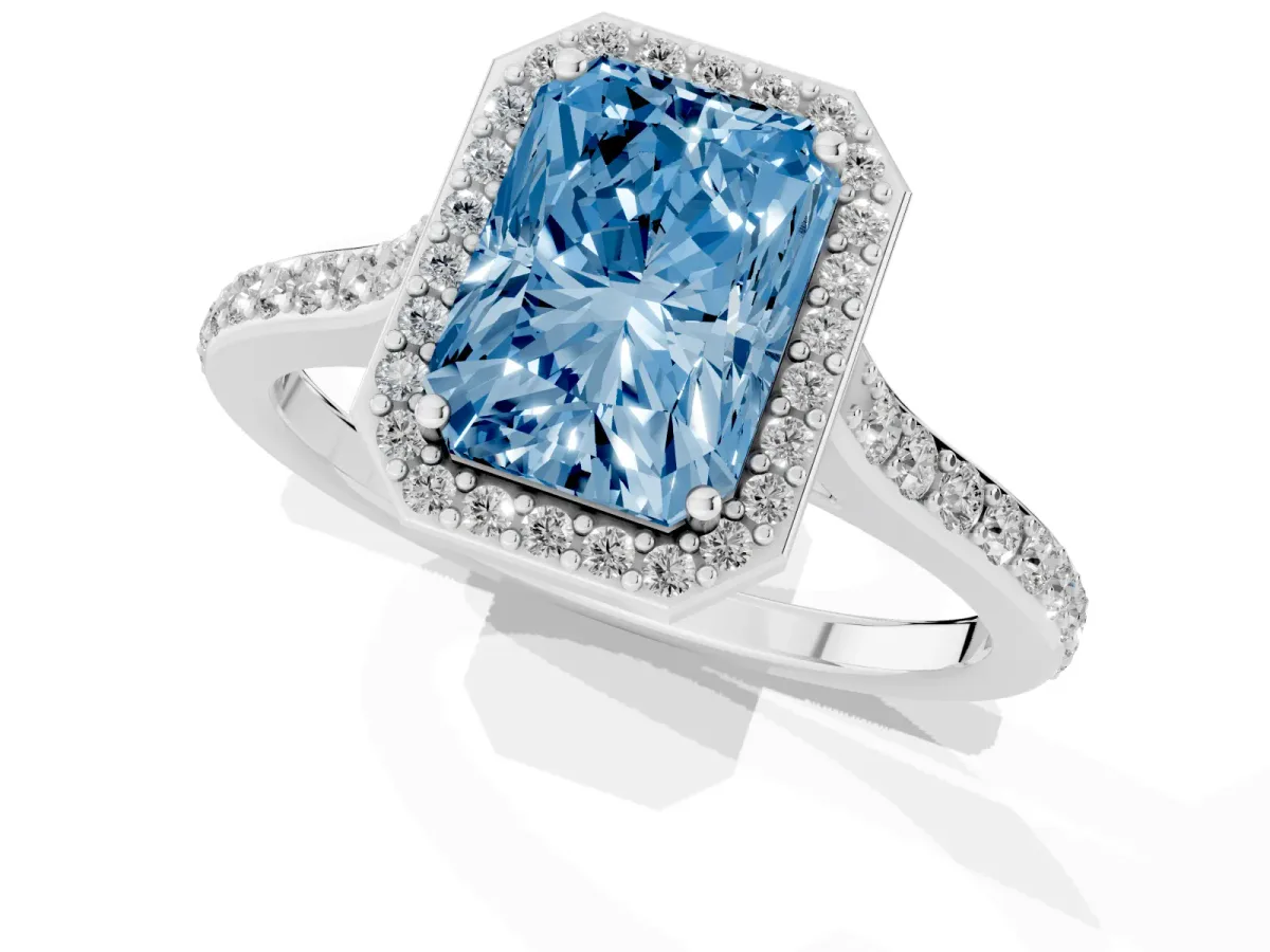 Fancy Blue Radiant Cut Diamond Halo Engagement Ring with Round Pavé Shoulders and Prong Setting Platinum