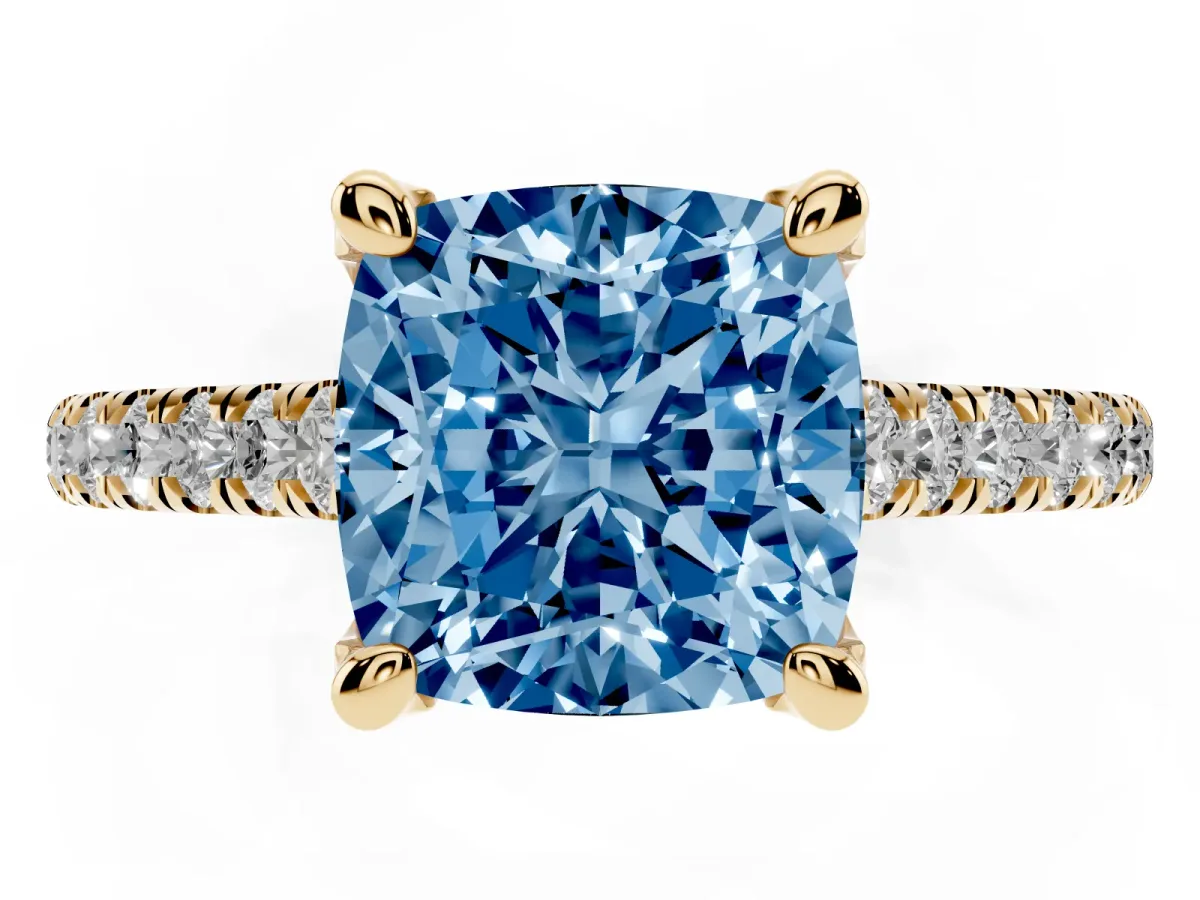 Fancy Blue Cushion Cut Brilliant Diamond Solitaire with Pavé Band and Four-Prong Setting Yellow gold