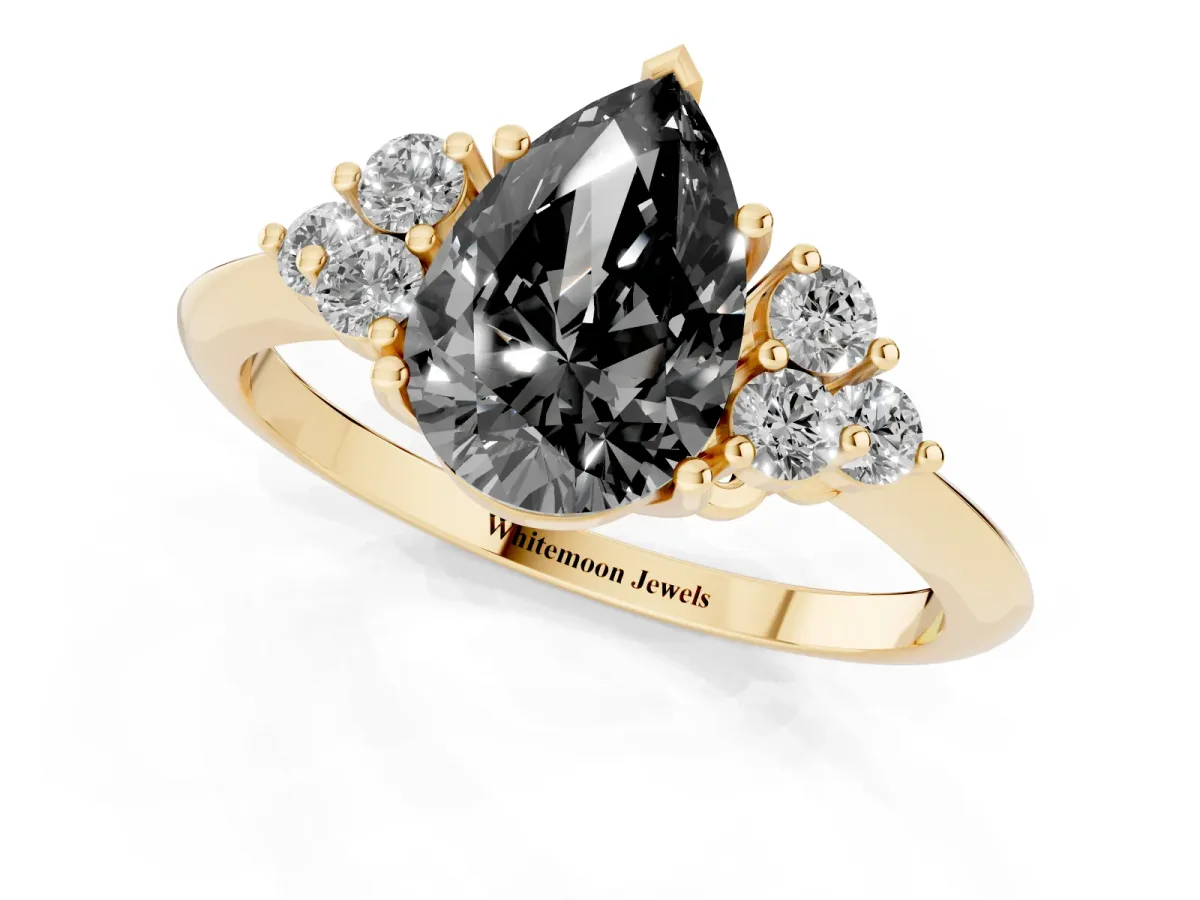 Fancy Black Pear Cut Cut Diamond Cluster Ring with Solitaire Band and Four-Prong Setting Yellow gold