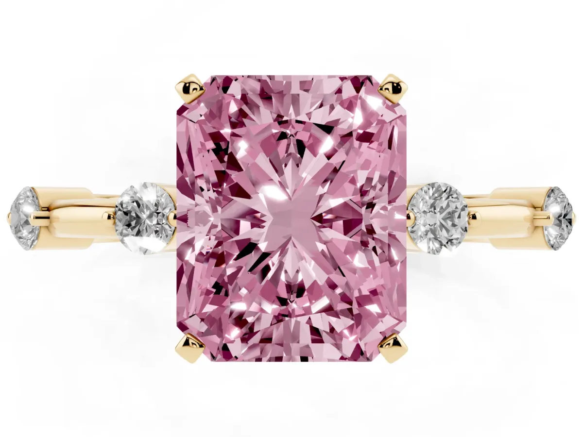 Fancy Pink Radiant Cut Solitaire Diamond Ring with Bezel Set Side Stones and Prong Setting Yellow gold